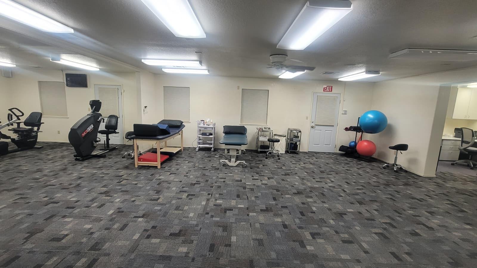 Physical therapist working with a patient at Restore Physical Therapy